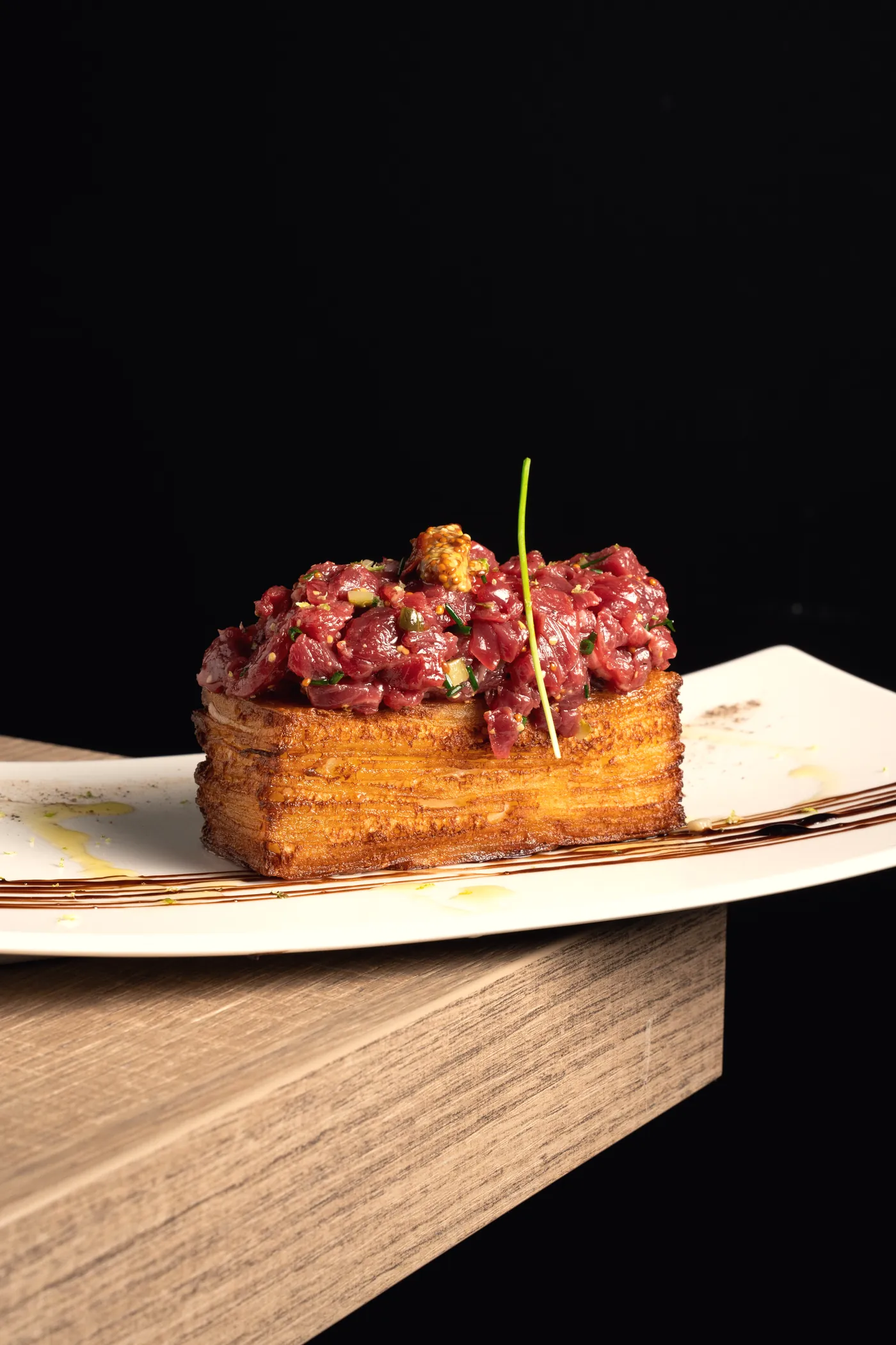 Tartare di filetto su millefoglie di patate